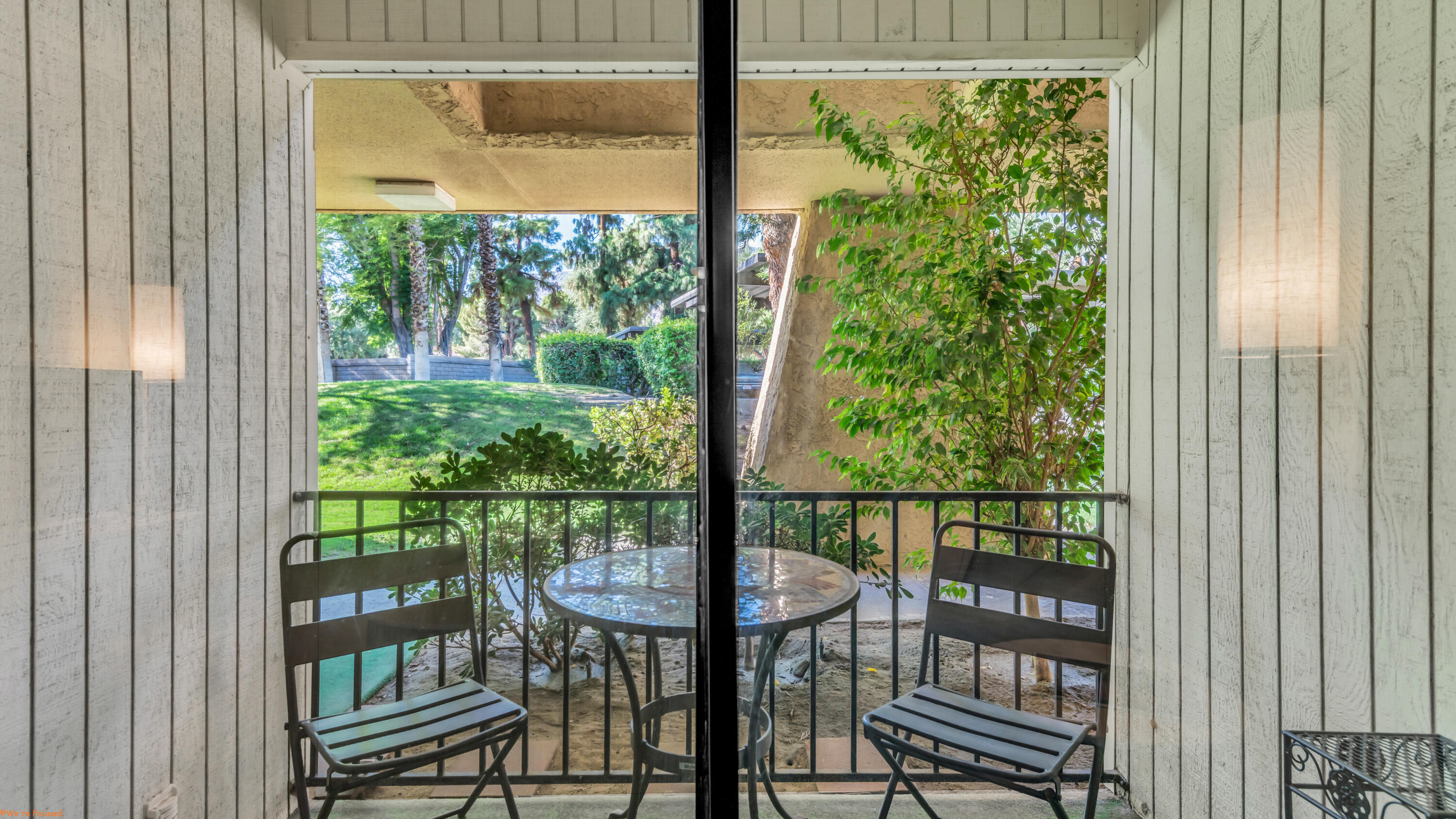 2800 Los Felices Circle North, Unit 107 Palm Springs, CA 92262 - Photo 6 of 18 a view of a room with balcony and furniture