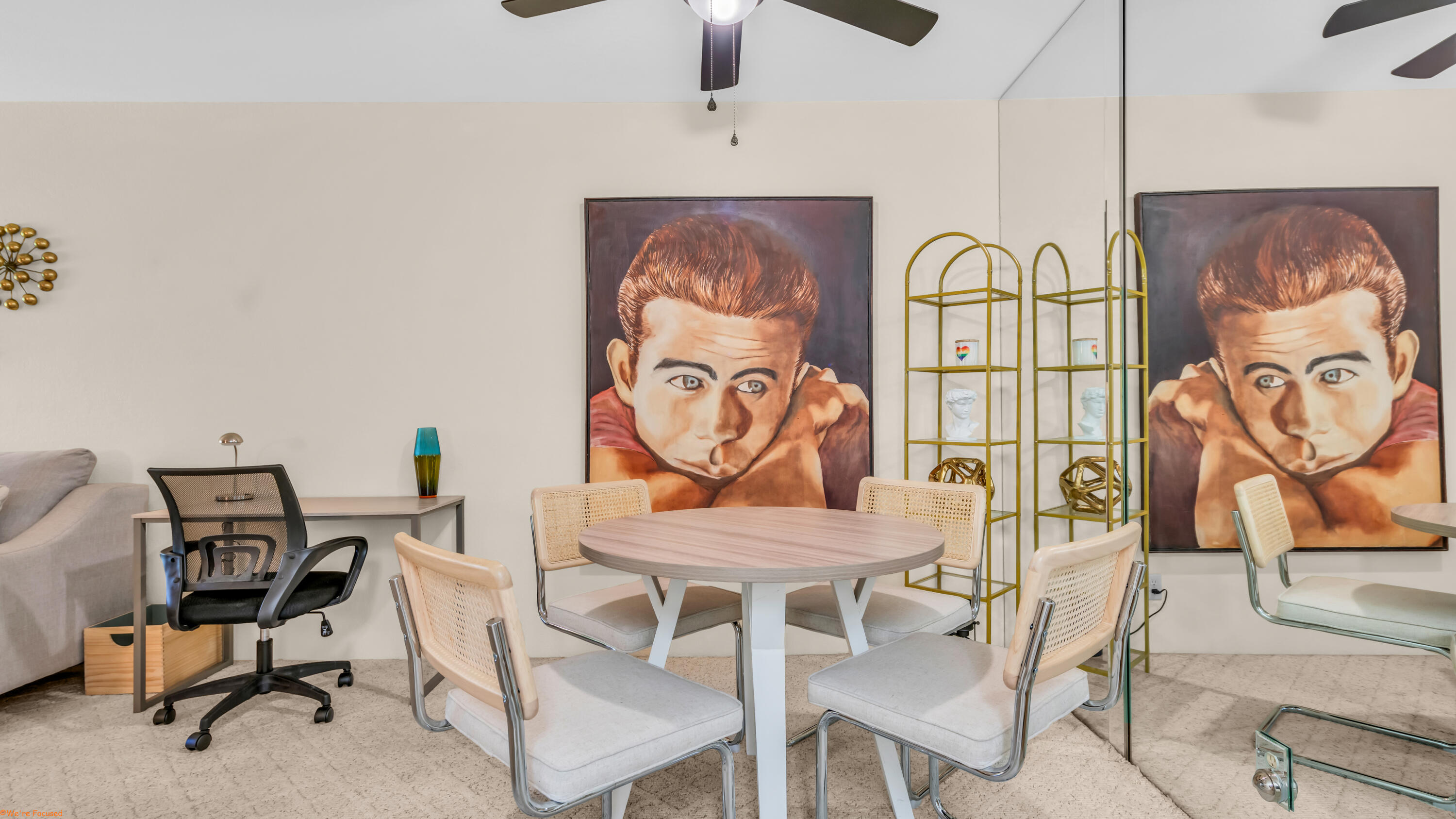 2800 Los Felices Circle North, Unit 107 Palm Springs, CA 92262 - Photo 9 of 18 a view of a dining room with furniture wooden floor and a chandelier
