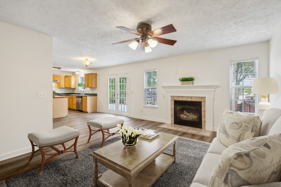1948 Portway Road Spring Hill, TN 37174 - Photo 11 of 28 a living room with furniture and a fireplace