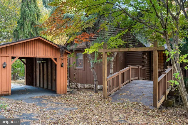a view of a room with wooden floors