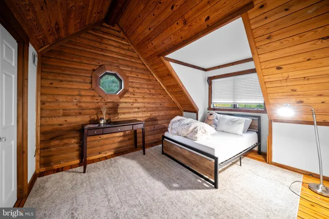 a view of a balcony with wooden floor