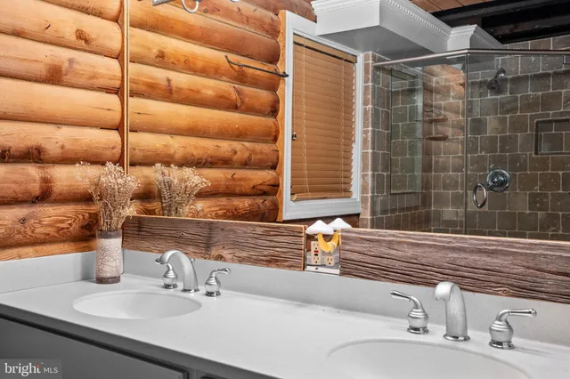 a view of entryway with wooden floor and stairs