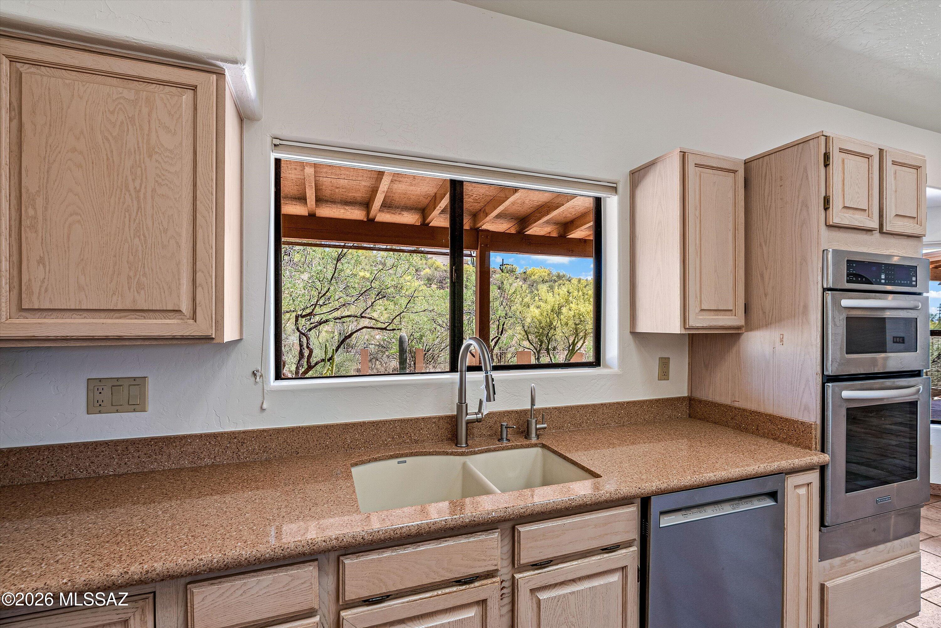 6340 North Valley View Road Tucson, AZ 85718 - Photo 18 of 44 Kitchen with Backyard View