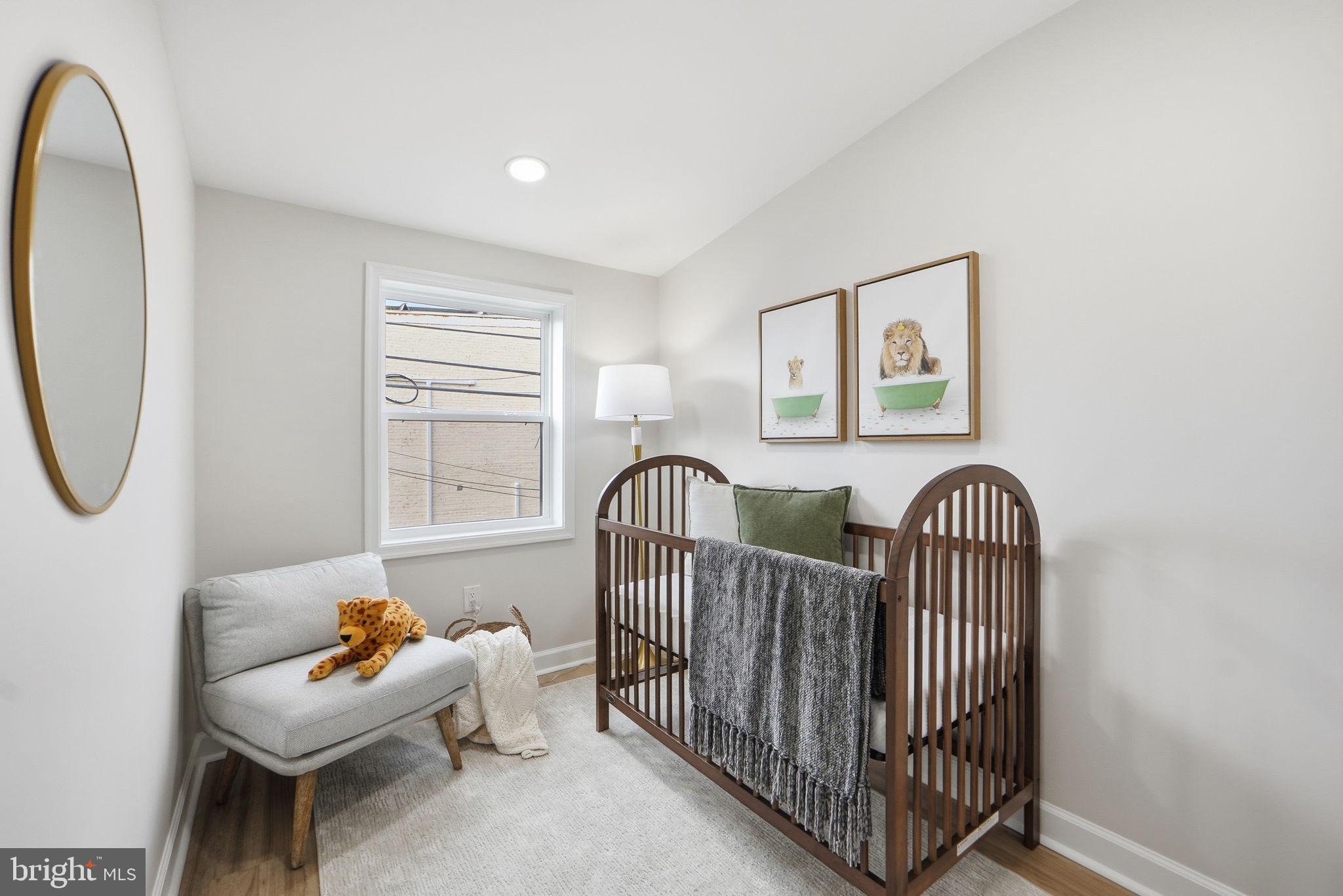 1412 Trinidad Avenue Northeast Washington, DC 20002 - Photo 33 of 47 a living room with furniture and a window