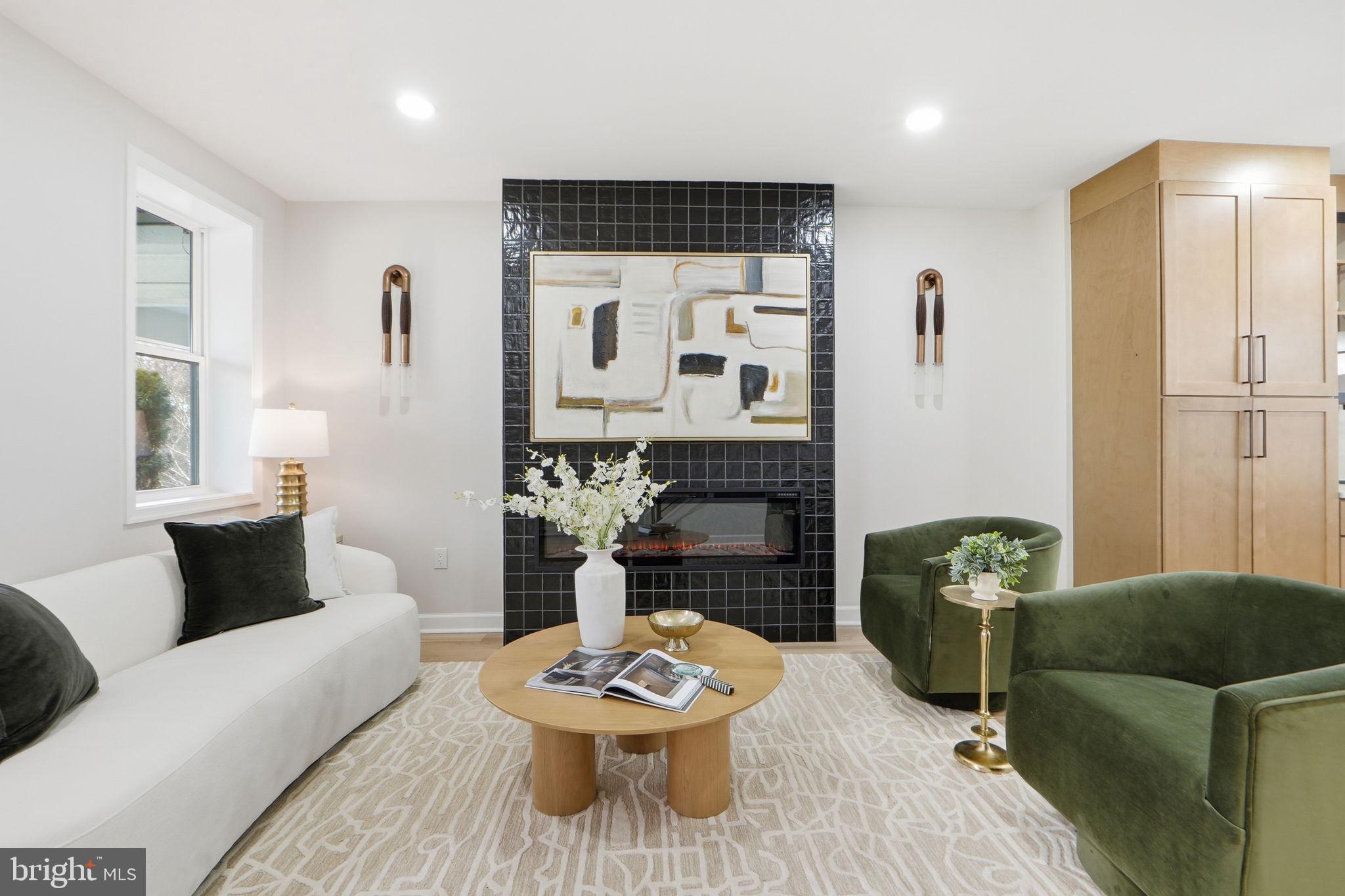 1412 Trinidad Avenue Northeast Washington, DC 20002 - Photo 6 of 47 a living room with furniture and a fireplace