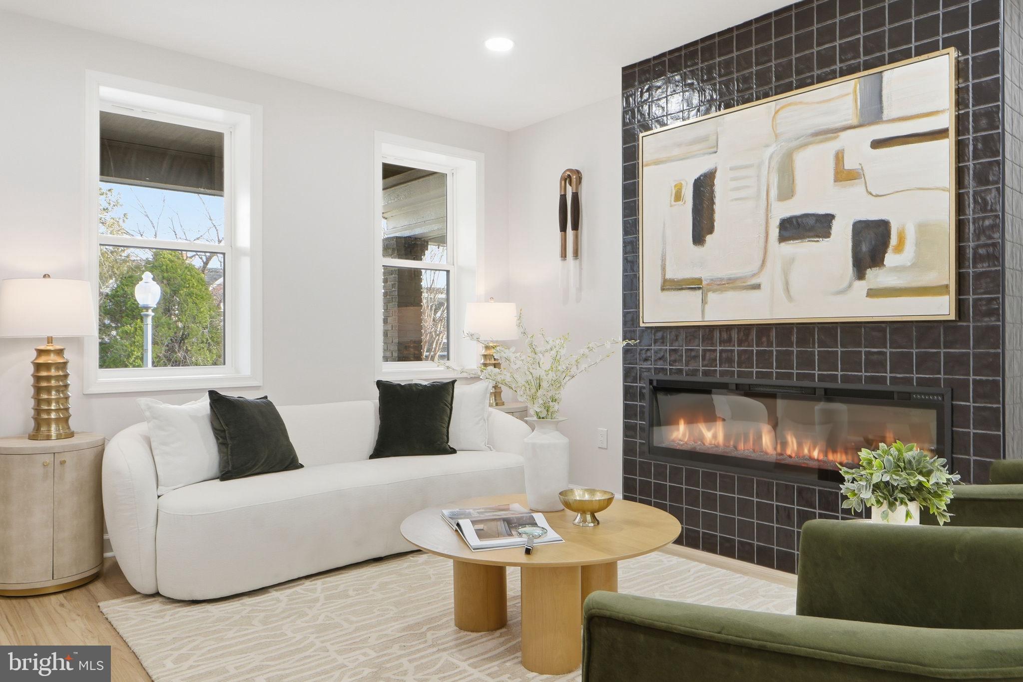 1412 Trinidad Avenue Northeast Washington, DC 20002 - Photo 8 of 47 a living room with furniture and a fireplace