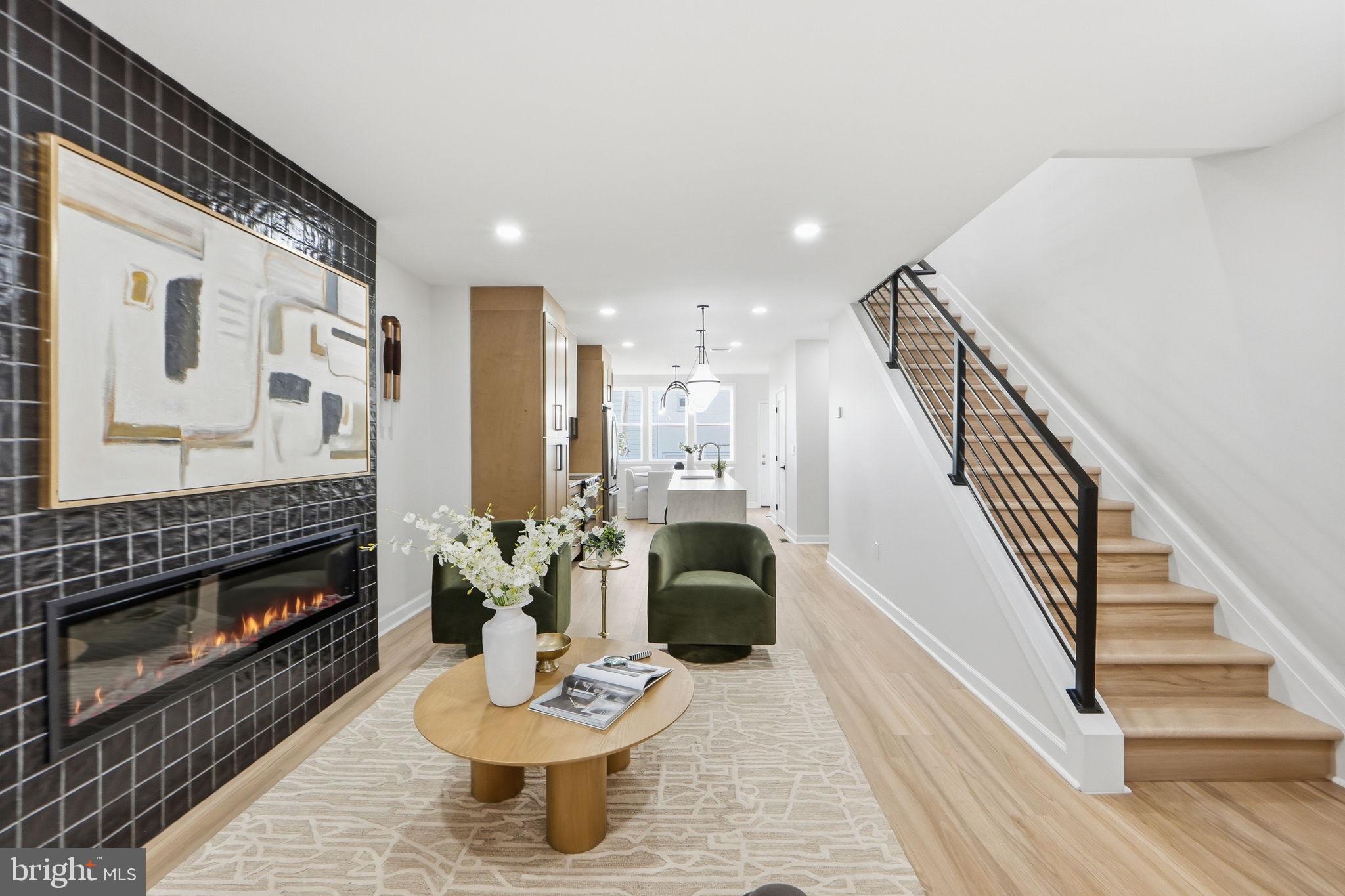 1412 Trinidad Avenue Northeast Washington, DC 20002 - Photo 9 of 47 a living room with furniture and a fireplace