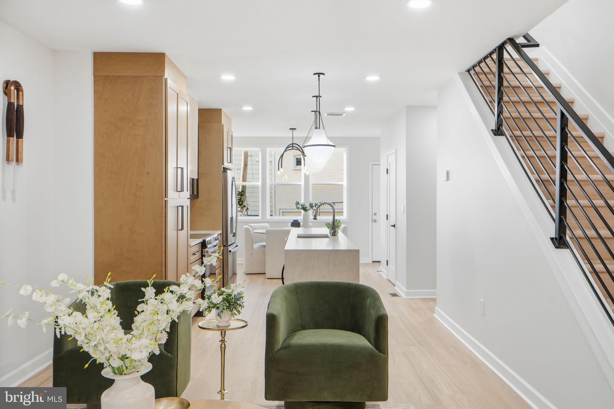 1412 Trinidad Avenue Northeast Washington, DC 20002 - Photo 10 of 47 a living room with furniture and a chandelier