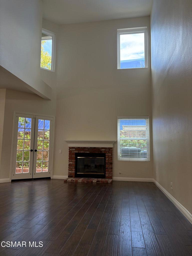 12015 River Grove Court Moorpark, CA 93021 - Photo 6 of 33 wooden floor in an empty room with a window