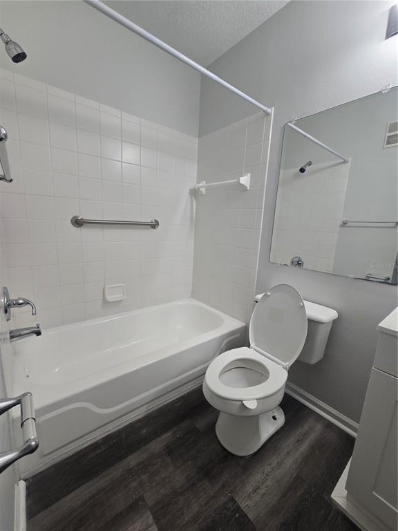 4316 South Kirkman Road, Unit 1608 Orlando, FL 32811 - Photo 12 of 16 a bathroom with a toilet and a bathtub