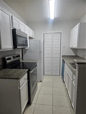 a bathroom with a shower and a toilet