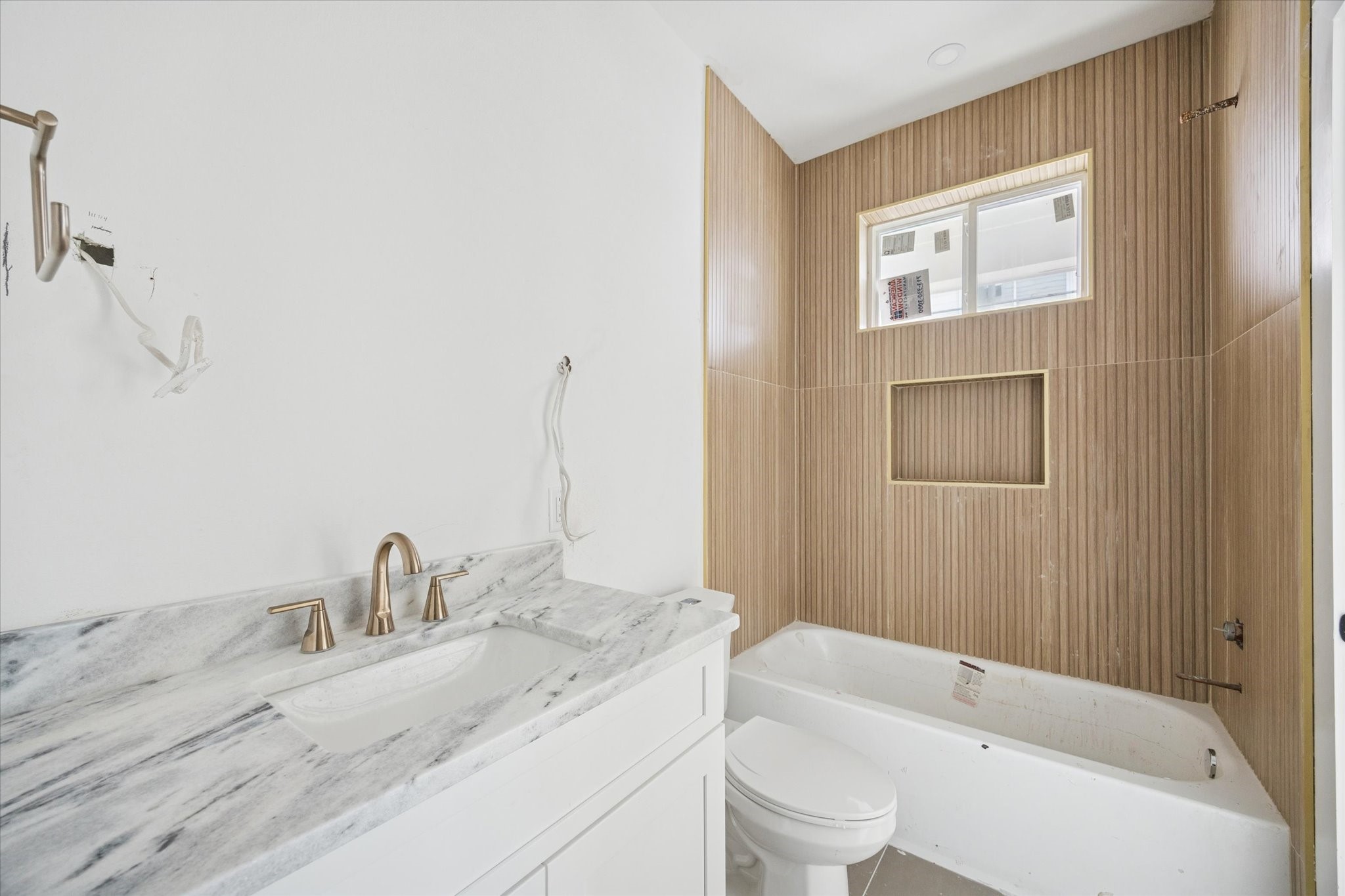 1034 West 17th Street, Unit D Houston, TX 77008 - Photo 13 of 27 Secondary bathroom as of February 12, 2026