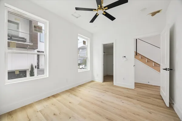 a view of an empty room and window