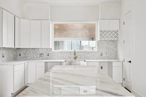 a bath room with a bathtub and a shower
