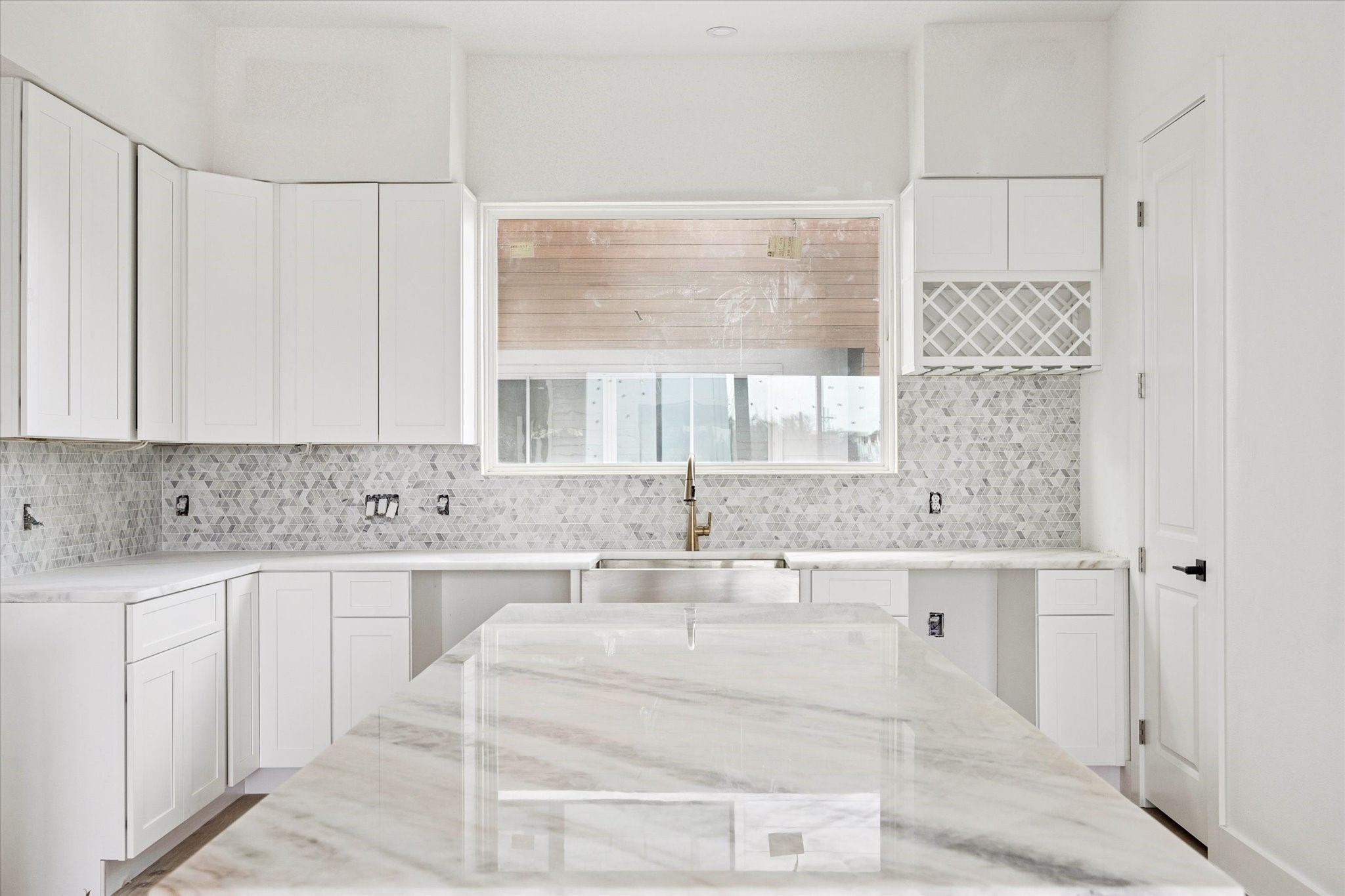 1034 West 17th Street, Unit D Houston, TX 77008 - Photo 2 of 27 View of the kitchen as of February 12, 2026