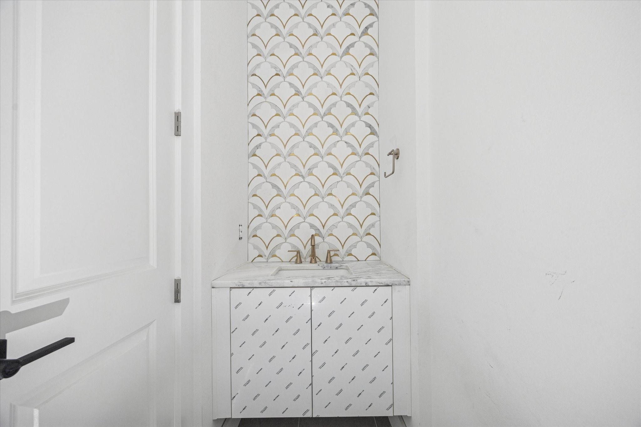 1034 West 17th Street, Unit D Houston, TX 77008 - Photo 5 of 27 View of the powder bath as of February 12, 2026