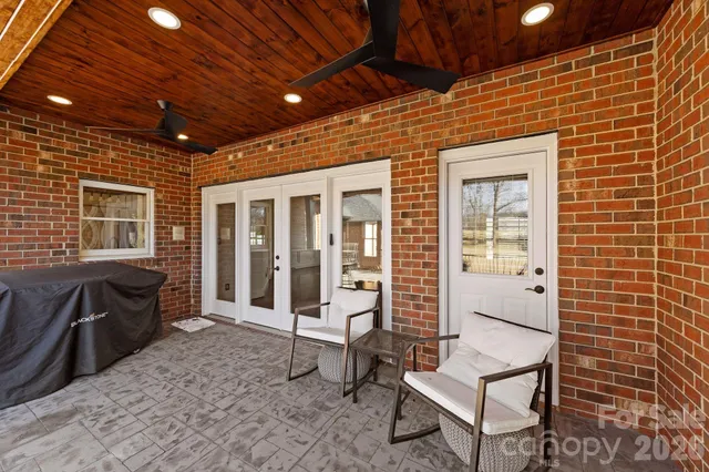 a view of a porch with furniture