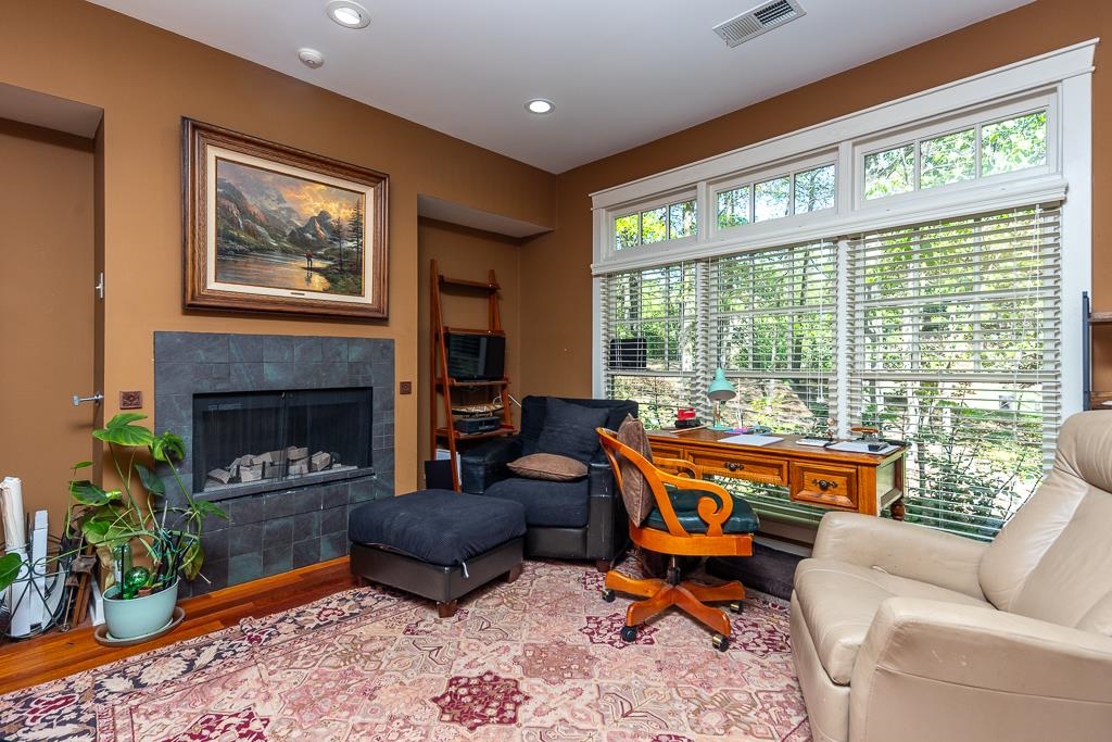 9382 Riveredge Drive Memphis, TN 38018 - Photo 7 of 40 The study has a gas fireplace and plenty of space to add built-in bookcases.