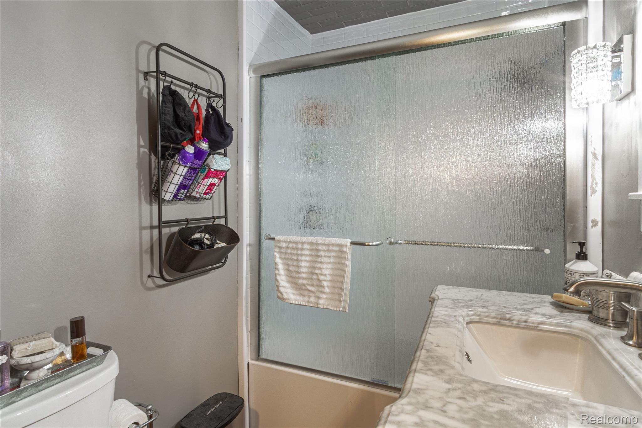 6047 North Latson Road Howell, MI 48855 - Photo 6 of 18 New shower with glass doors, new vanity