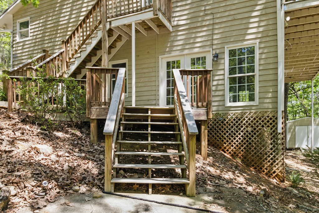 15635 Us Highway Hamilton, GA 31811 - Photo 37 of 66 Side deck stairs lead to Exercise Rm.