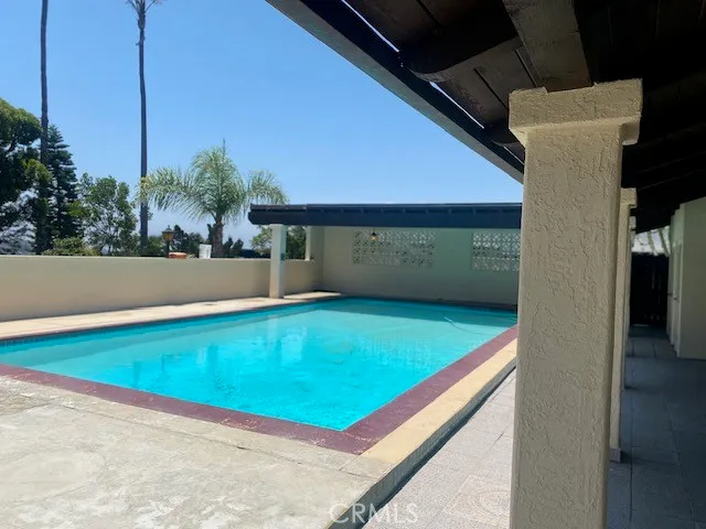 a view of outdoor space and front view of a house
