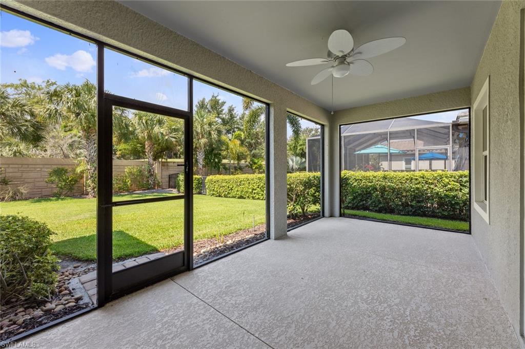 3711 Canopy Circle Naples, FL 34120 - Photo 25 of 28 a view of a big room with an empty space and balcony