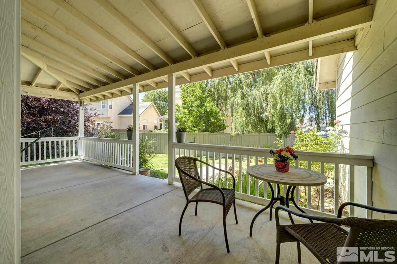 9721 Oakley Lane Reno, NV 89521 - Photo 5 of 40 a view of a chairs and table in the patio