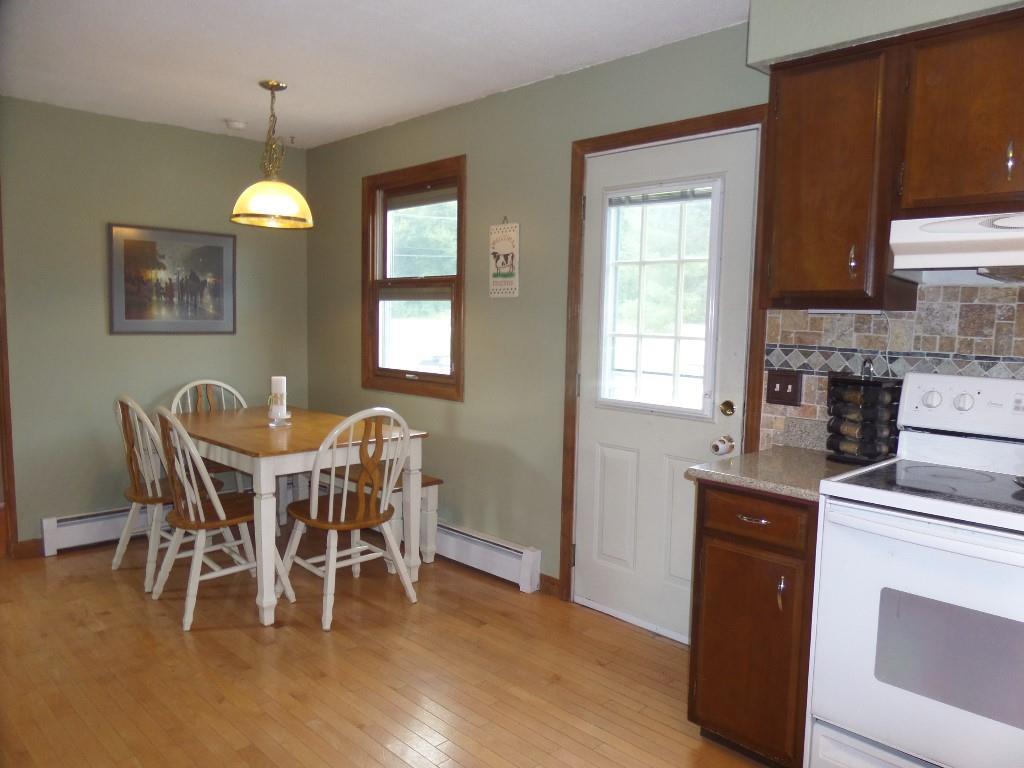 576 Main Road Eddington, ME 04428 - Photo 4 of 29 dining area opens to the livingroom