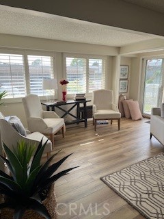 1860 St John Road Seal Beach, CA 90740 - Photo 6 of 10 a living room with furniture and a large window