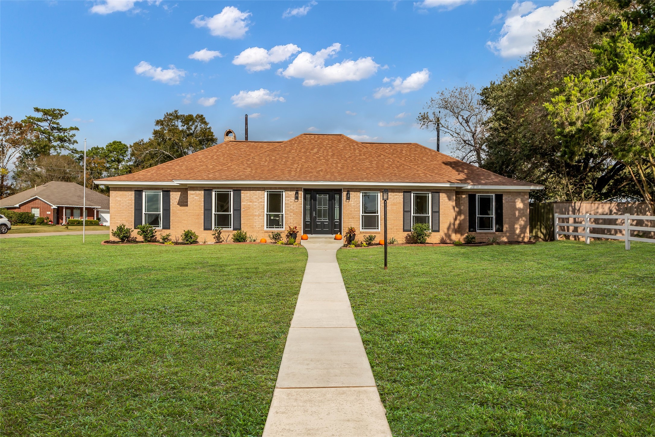3518 Shore Shadows Drive Crosby, TX 77532 - Photo 1 of 42 a front view of a house with a garden
