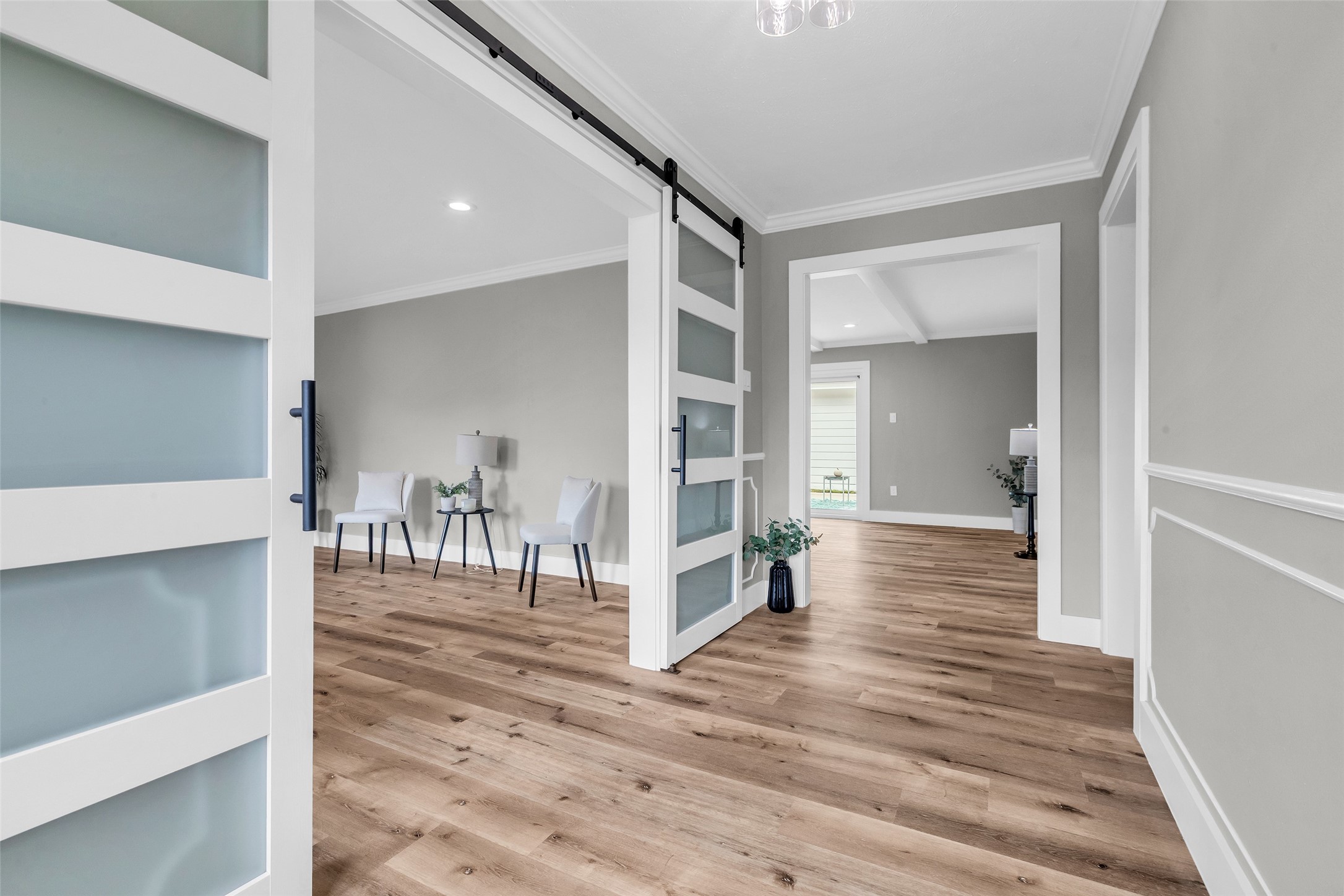 3518 Shore Shadows Drive Crosby, TX 77532 - Photo 17 of 42 a view of a hallway with wooden floor and staircase