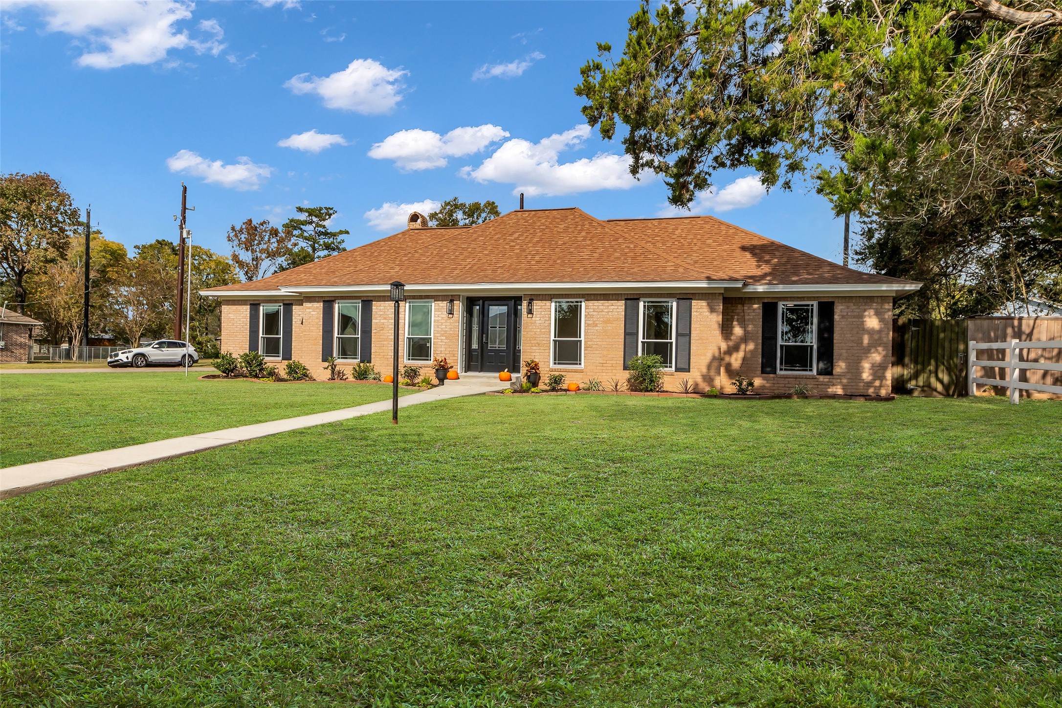 3518 Shore Shadows Drive Crosby, TX 77532 - Photo 35 of 42 a front view of a house with a garden
