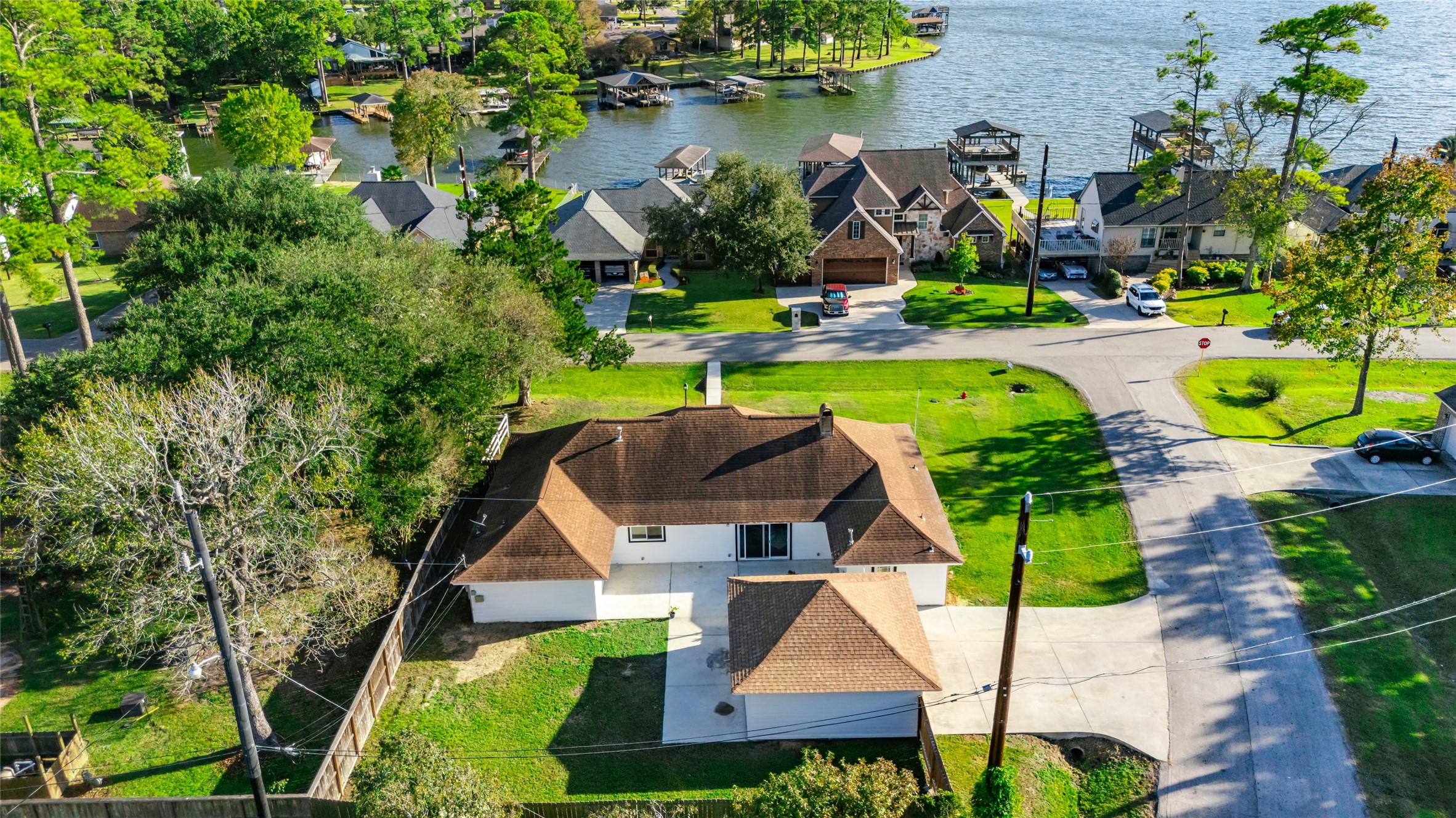 3518 Shore Shadows Drive Crosby, TX 77532 - Photo 39 of 42 an aerial view of a house with outdoor space pool patio and lake view
