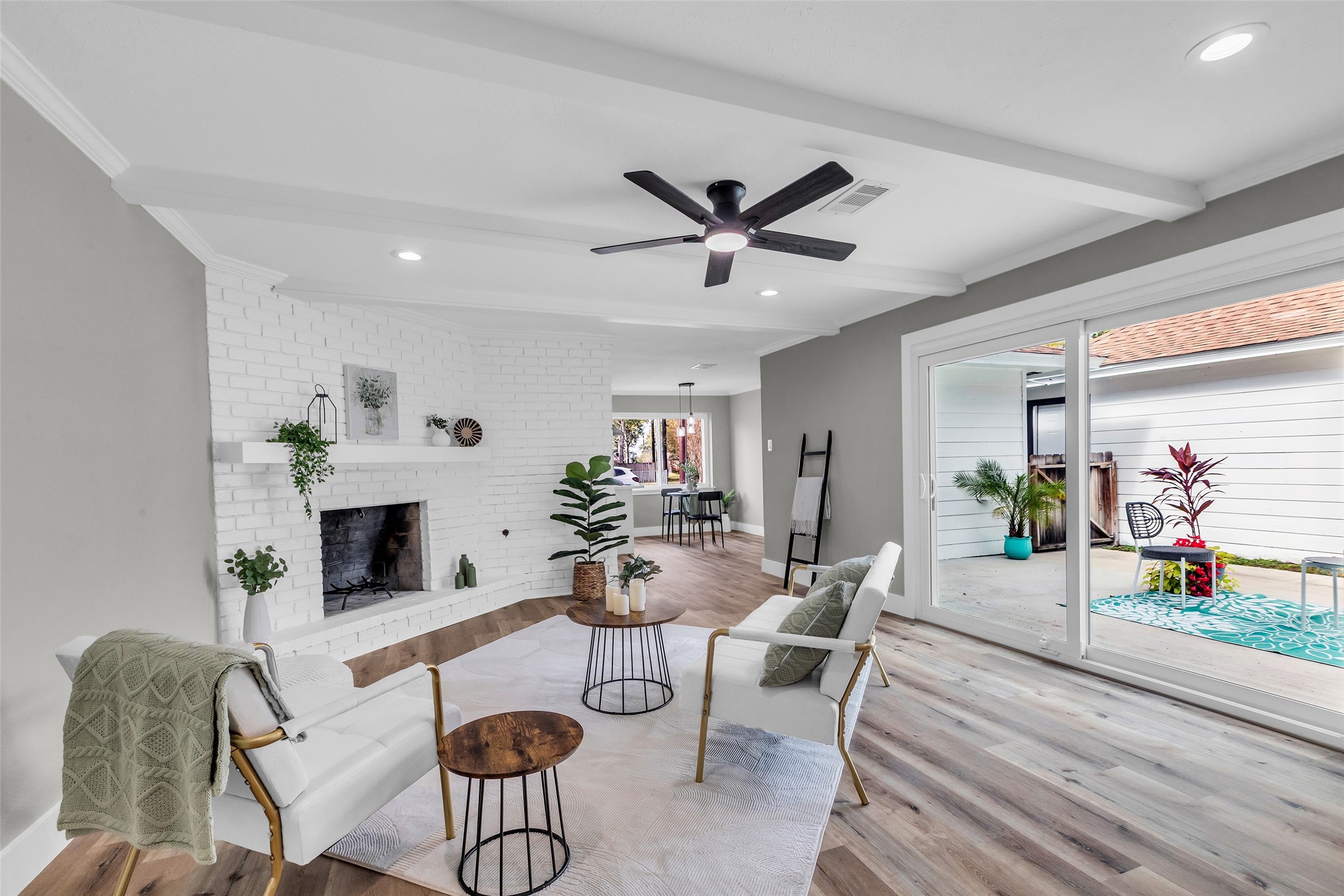 3518 Shore Shadows Drive Crosby, TX 77532 - Photo 5 of 42 a living room with furniture and a fireplace