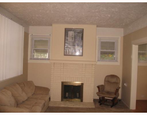 3128 Middletown Road Sheraden, PA 15204 - Photo 2 of 13 Living Room. Wood and Gas burning fireplace