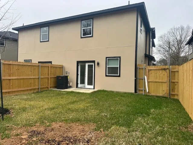 a view of a backyard of the house