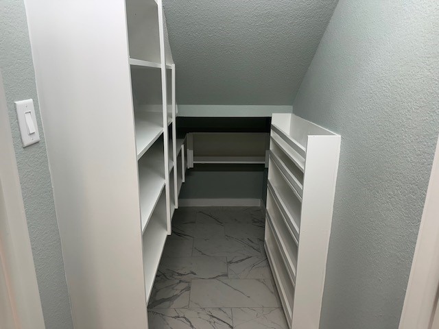 161 South 10th Street, Unit A Conroe, TX 77301 - Photo 8 of 16 a view of walk in closet