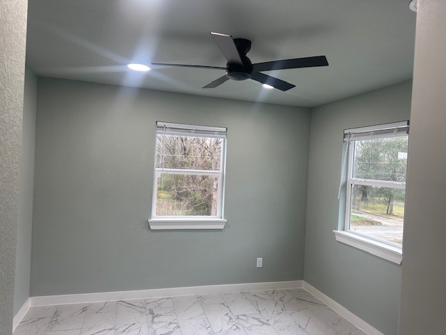 161 South 10th Street, Unit A Conroe, TX 77301 - Photo 10 of 16 an empty room with a window