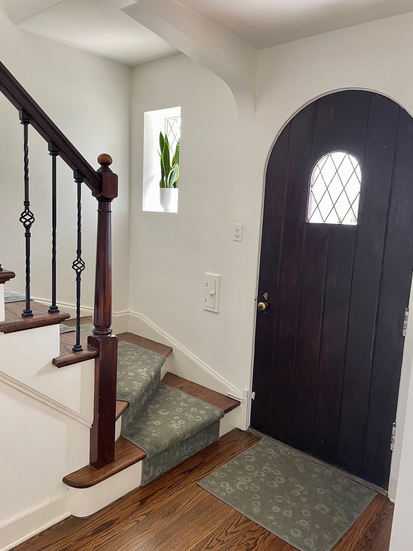 636 Selborne Road Riverside, IL 60546 - Photo 3 of 25 a view of entryway and hall with wooden floor