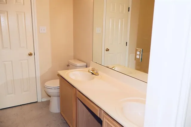 a bathroom with a sink and a toilet