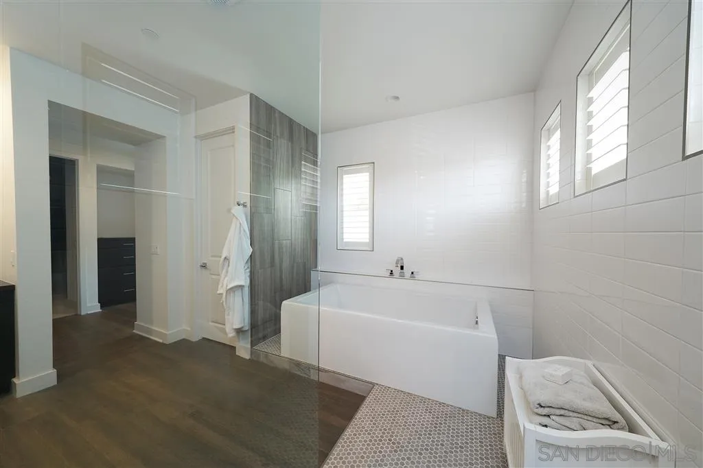 672 Polaris Drive Encinitas, CA 92024 - Photo 12 of 26 a bathroom with a bathtub and a sink