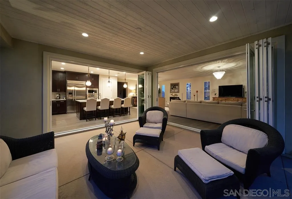 672 Polaris Drive Encinitas, CA 92024 - Photo 15 of 26 a living room with furniture and a view of kitchen