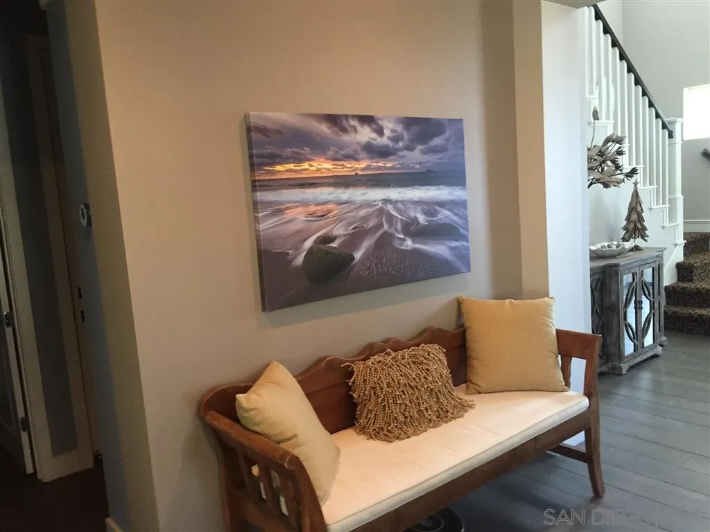672 Polaris Drive Encinitas, CA 92024 - Photo 17 of 26 a living room with furniture and a wooden floor