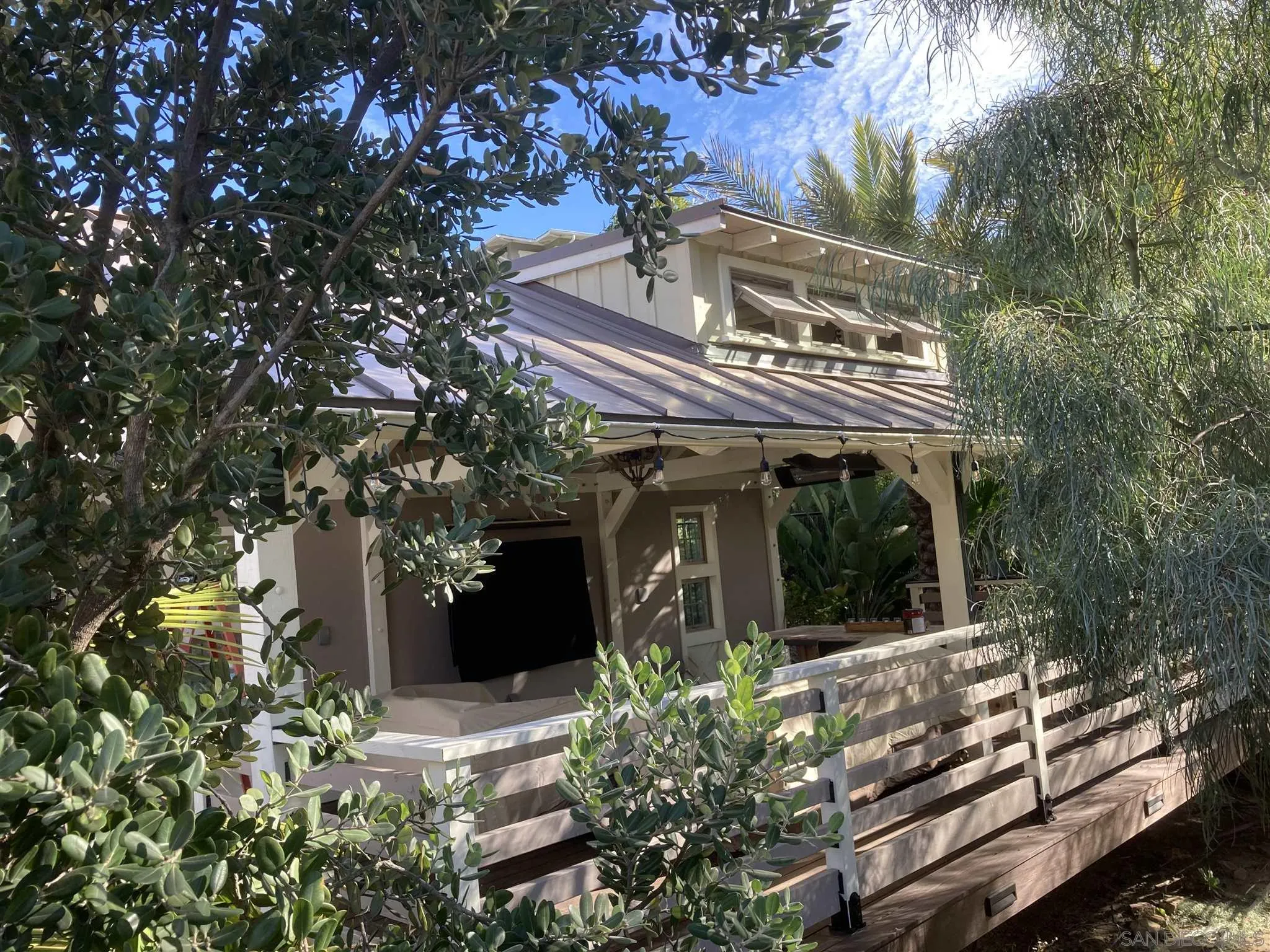 672 Polaris Drive Encinitas, CA 92024 - Photo 22 of 26 front view of a house with a garden