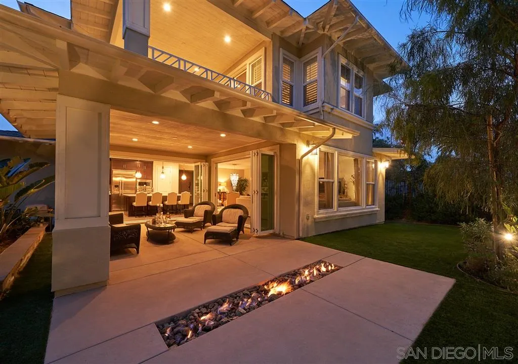 672 Polaris Drive Encinitas, CA 92024 - Photo 23 of 26 a view of a patio with couches table and chairs and potted plants