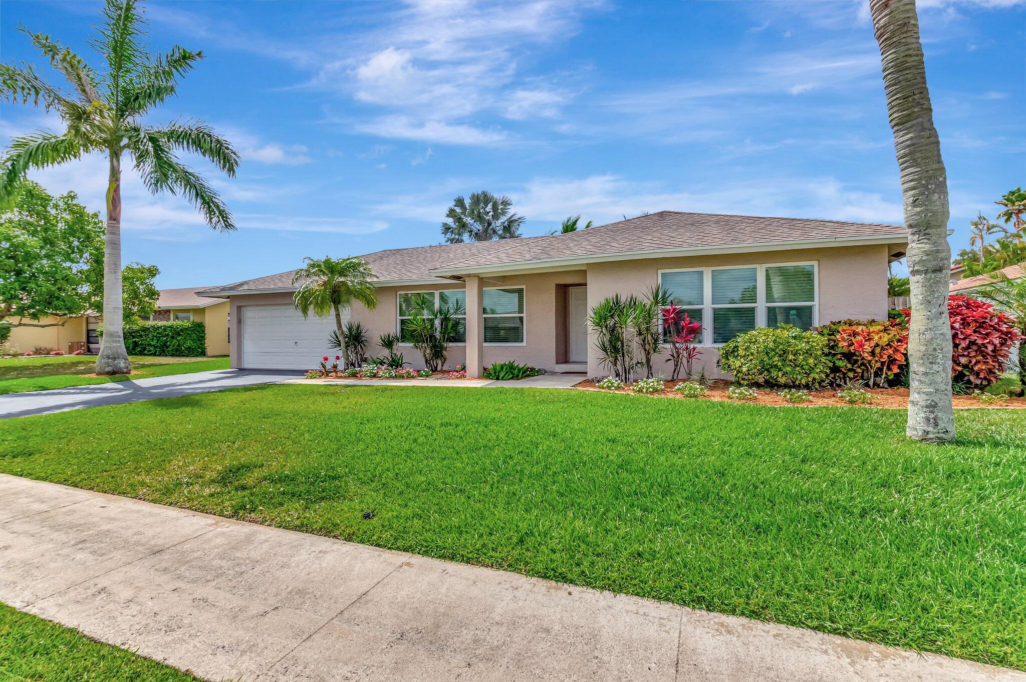 11390 Chipmunk Drive Boca Raton, FL 33428 - Photo 1 of 46 Front