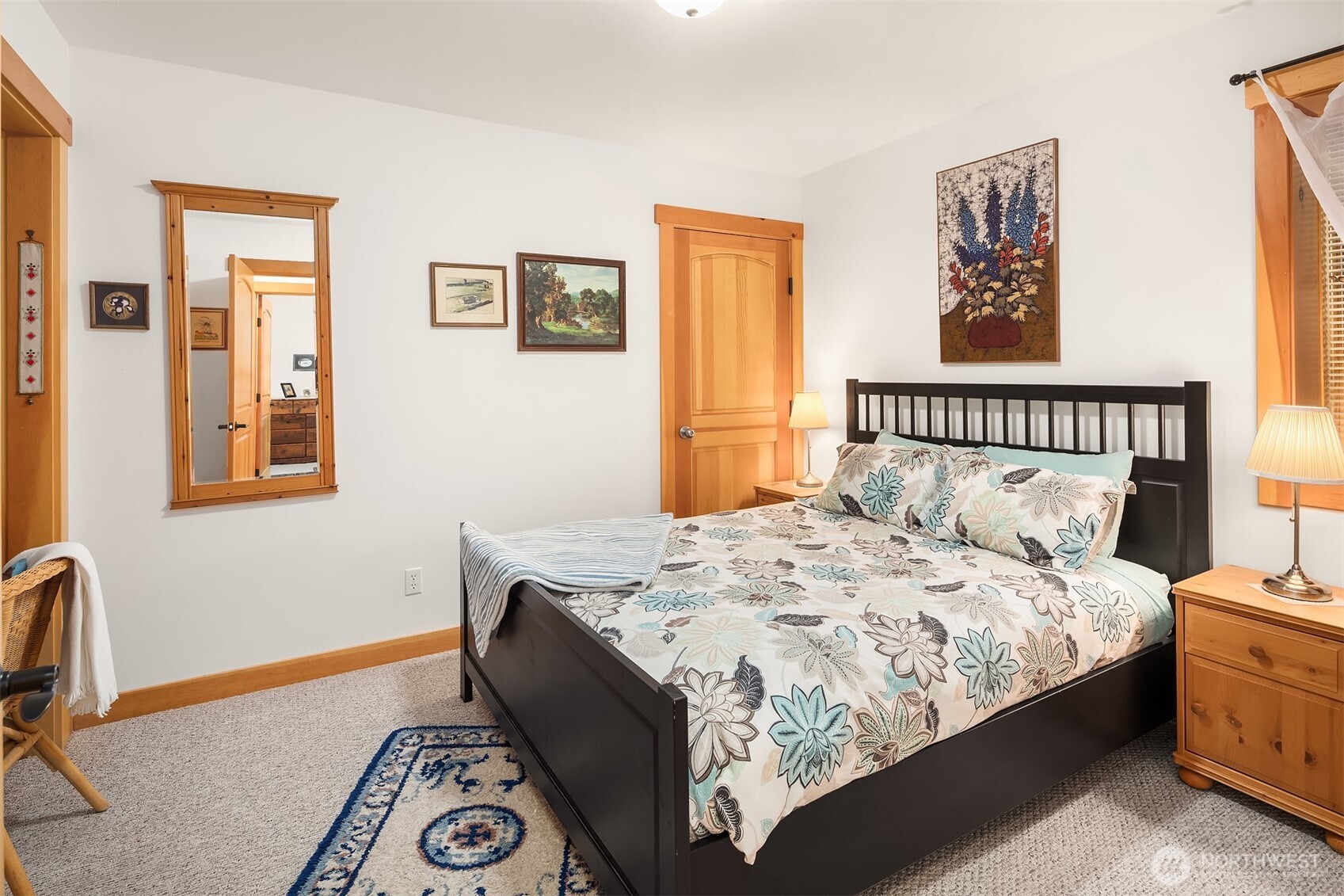 951 Willems Road Cashmere, WA 98815 - Photo 28 of 40 a bedroom with a bed and painting on the wall