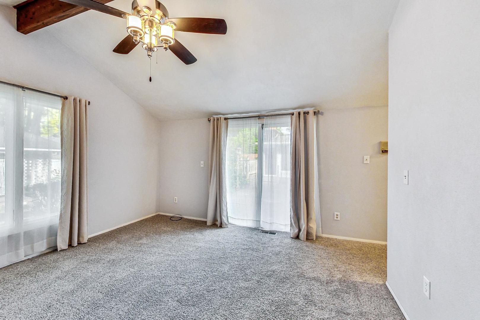 311 Deerpath Drive Winthrop Harbor, IL 60096 - Photo 20 of 48 an empty room with chandelier fan