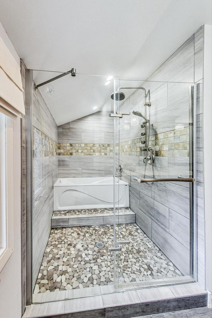 311 Deerpath Drive Winthrop Harbor, IL 60096 - Photo 22 of 48 a bathroom with a glass shower door and a glass door shower