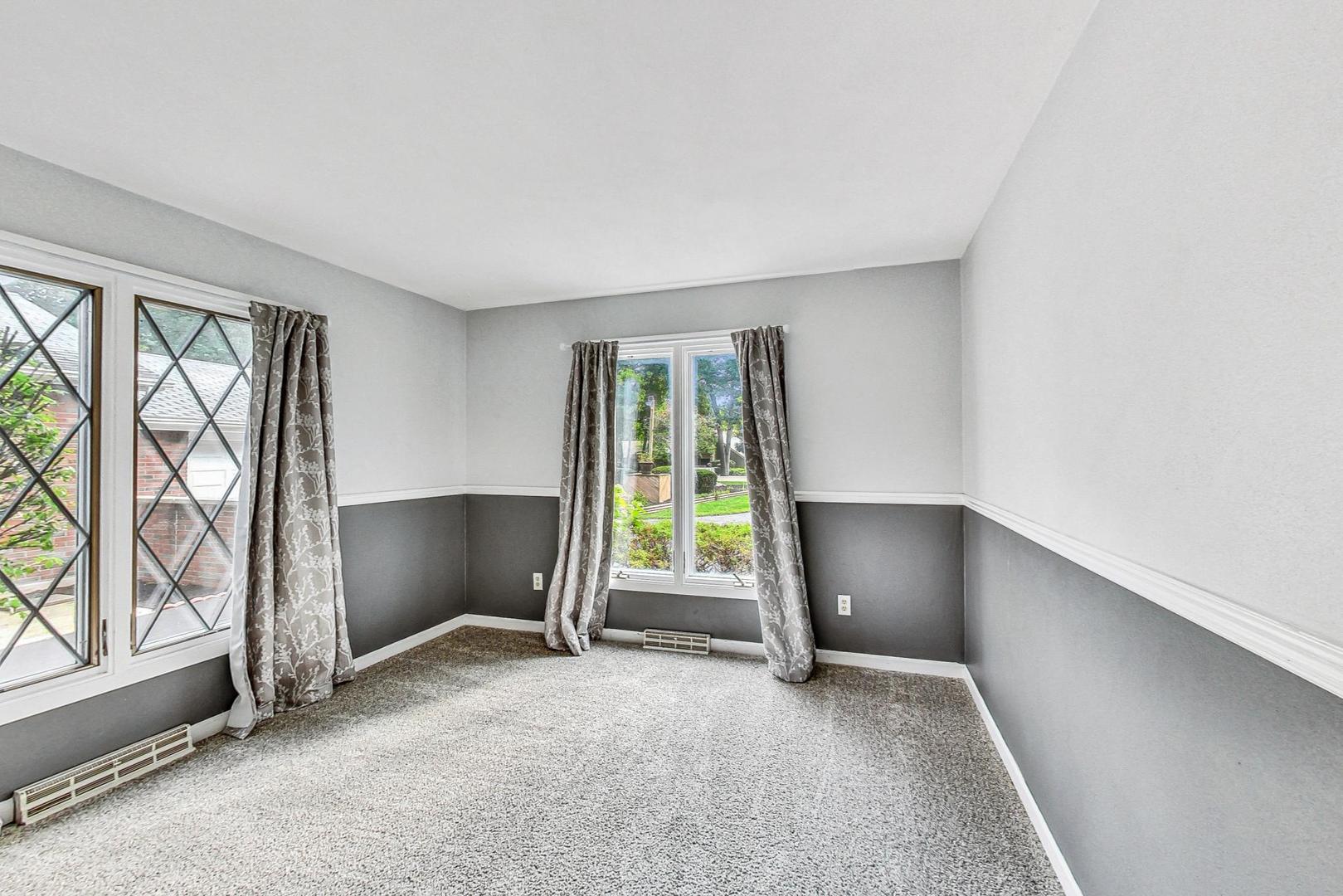 311 Deerpath Drive Winthrop Harbor, IL 60096 - Photo 24 of 48 an empty room with windows and closet